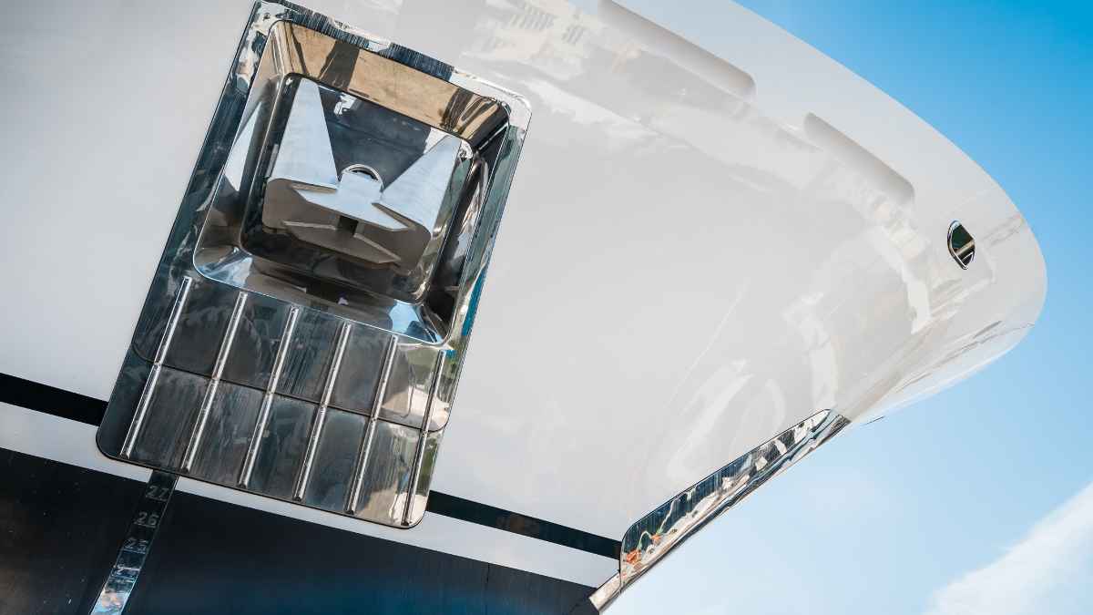 Bow of a superyacht showing anchor