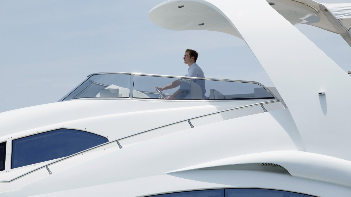 Man driving a yacht
